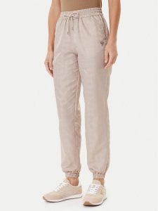 Guess Spodnie dresowe V5YB14 WHFU0 Beżowy Regular Fit. Brązowe spodnie dresowe Guess, l, z aplikacjami, z dresówki. Za 304,00 zł.