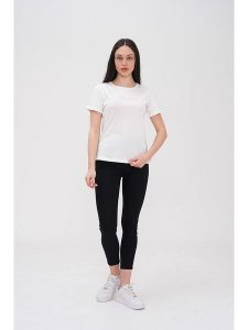 Basics & More Koszulka w kolorze białym rozmiar: L. Białe bluzki Basics & More, l, bez wzorów, z bawełny, bez kołnierzyka, bez ramiączek. Za 92,21 zł.