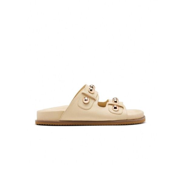 Sandały GIOSEPPO WRENTHAM Beżowy. Białe sandały Gioseppo, bez wzorów, ze skóry, bez obcasa, bez zapięcia. Za 313,99 zł.