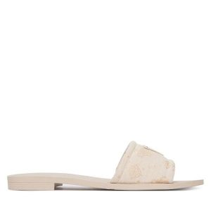 Klapki Guess. Białe klapki Guess, z aplikacjami, bez obcasa. Za 329,99 zł.