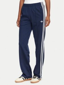 Adidas Spodnie dresowe Firebird Classic KS4795 Granatowy Regular Fit. Niebieskie spodnie dresowe ADIDAS, s, bez wzorów, z dresówki. Za 299,99 zł.