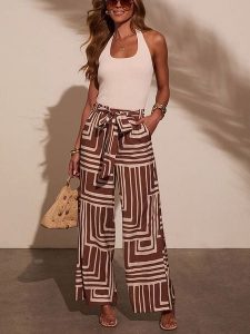 Milan Kiss Top w kolorze kremowym rozmiar: S. Brązowe topy Milan Kiss, s, bez wzorów, bez kołnierzyka, bez ramiączek. Za 127,35 zł.