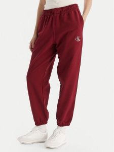Calvin Klein Jeans Spodnie dresowe Monologo LV047B235G Bordowy Regular Fit. Czerwone spodnie dresowe Calvin Klein Jeans, m, bez wzorów, z bawełny. Za 319,99 zł.