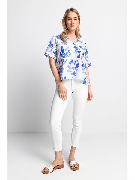 Rich & Royal Bluzka w kolorze biało-niebieskim rozmiar: 40. Białe bluzki Rich & Royal, bez wzorów, z wiskozy, bez kołnierzyka, bez ramiączek. Za 135,49 zł.