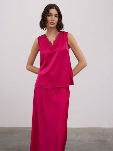 BGN Top w kolorze różowym rozmiar: 38. Różowe topy BGN, bez wzorów, bez kołnierzyka, bez ramiączek. Za 56,99 zł.