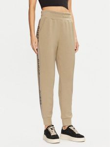 Guess Spodnie dresowe W5RB00 KBYE2 Zielony Regular Fit. Zielone spodnie dresowe Guess, s, z aplikacjami, z dresówki. Za 349,99 zł.