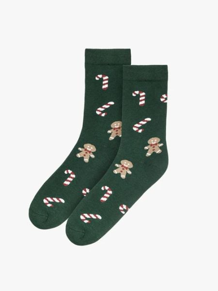 Zielone bawełniane skarpety ze świątecznym motywem. Zielone skarpetki Ryłko, bez wzorów, z bawełny. W wyprzedaży za 14,99 zł.