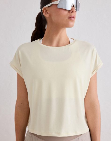 Damski top treningowy ultramiękki second skin, szybkoschnący Soft Basic żółty. Żółte topy AIM'N, l, bez wzorów, z elastanu, klasyczne, bez kołnierzyka, bez ramiączek. Za 121,60 zł.