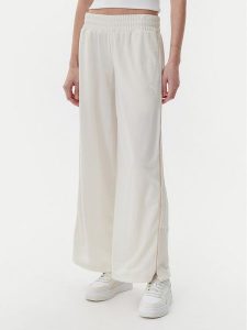 Puma Spodnie dresowe Ess 629804 Beżowy Wide Leg. Brązowe spodnie dresowe Puma, xl, bez wzorów, z dresówki. Za 219,99 zł.