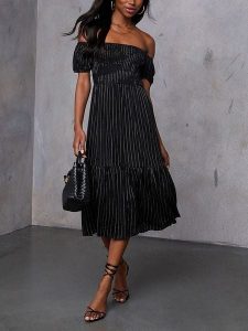 Milan Kiss Sukienka w kolorze czarnym rozmiar: XL. Czarne sukienki Milan Kiss, xl, bez wzorów, z wiskozy, bez kołnierzyka, bez ramiączek, midi. Za 165,99 zł.