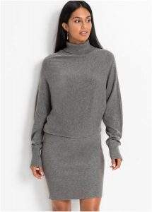Sukienka dzianinowa. Czarne sukienki bonprix, bez wzorów, z dzianiny, eleganckie, bez kołnierzyka, bez ramiączek. Za 137,99 zł.