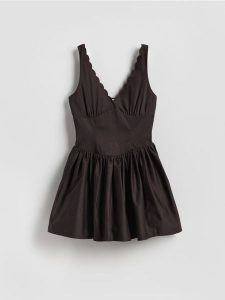 Kombinezon z bawełną - ciemnobrązowy. Brązowe kombinezony Reserved, bez wzorów, z bawełny, bez kołnierzyka, bez ramiączek. Za 159,99 zł.