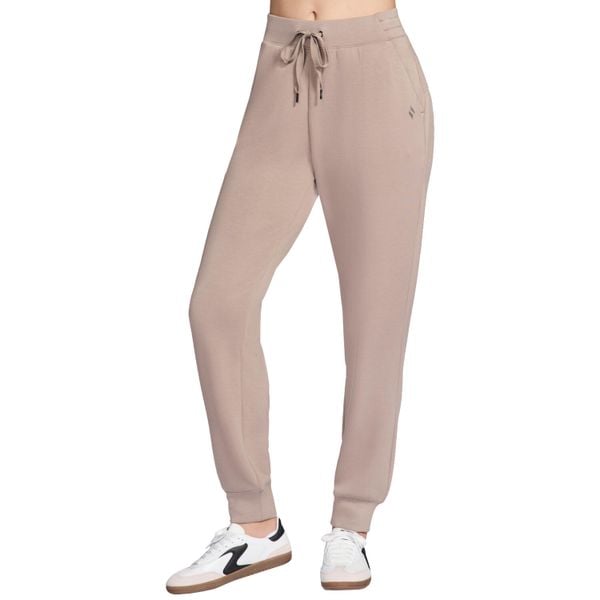 Spodnie sportowe damskie Skechluxe Elevate Jogger Pant. Brązowe spodnie dresowe Skechers, bez wzorów, z poliesteru. Za 229,99 zł.