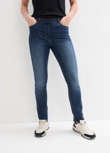 Jegginsy mid waist z wygodnym paskiem w talii. Niebieskie spodnie z wysokim stanem bonprix, bez wzorów, z jeansu. Za 79,99 zł.