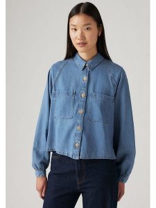 Levi's Bluzka dżinsowa w kolorze niebieskim rozmiar: XS. Niebieskie bluzki Levi's®, s, bez wzorów, z bawełny, bez kołnierzyka, bez ramiączek. Za 137,95 zł.