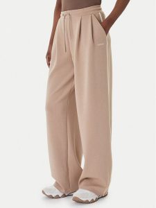 Guess Spodnie dresowe V6GB01 K2914 Beżowy Wide Leg. Brązowe spodnie dresowe Guess, s, z aplikacjami, z dresówki. Za 434,99 zł.