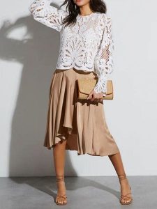 Milan Kiss Spódnica w kolorze beżowym rozmiar: S. Brązowe spódnice Milan Kiss, s, bez wzorów, midi. Za 126,99 zł.