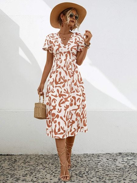 Ariel Tesoro Sukienka w kolorze biało-karmelowym rozmiar: 38. Białe sukienki Ariel Tesoro, bez wzorów, bez kołnierzyka, bez ramiączek, midi. Za 157,35 zł.