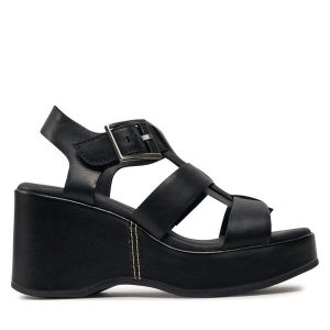 Sandały Clarks. Czarne sandały Clarks, bez wzorów, bez obcasa, na koturnie, bez zapięcia. Za 458,99 zł.
