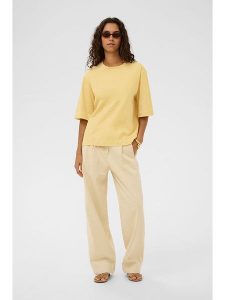 Soaked in Luxury Koszulka w kolorze żółtym rozmiar: M. Żółte bluzki Soaked in Luxury, m, bez wzorów, bez kołnierzyka, bez ramiączek. Za 104,99 zł.