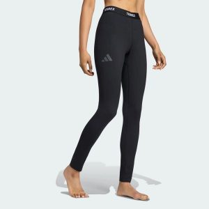 LEGGINSY BAZOWE TERREX MULTI SYNTHETIC. Czarne legginsy ADIDAS, bez wzorów, z dzianiny. Za 219,00 zł.