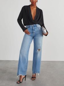 Milan Kiss Bluzka w kolorze czarnym rozmiar: L. Czarne bluzki Milan Kiss, l, bez wzorów, bez kołnierzyka, bez ramiączek. Za 130,99 zł.