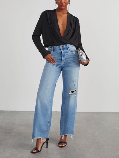 Milan Kiss Bluzka w kolorze czarnym rozmiar: M. Czarne bluzki Milan Kiss, m, bez wzorów, bez kołnierzyka, bez ramiączek. Za 130,99 zł.