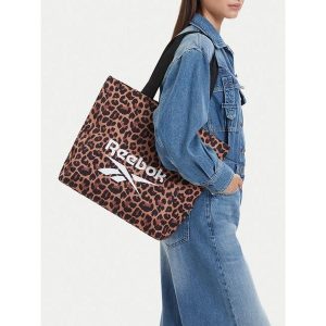 Torebka Reebok. Brązowe shopper bag Reebok, bez wzorów, bez dodatków. Za 119,99 zł.