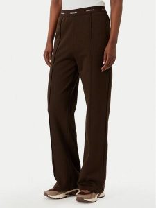 Calvin Klein Jeans Spodnie dresowe LV047G253G Brązowy ciemny Relaxed Fit. Brązowe spodnie dresowe Calvin Klein Jeans, xxl, bez wzorów, z bawełny. Za 409,99 zł.