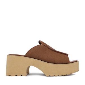 Klapki JENNY. Brązowe klapki Jenny, bez wzorów, bez obcasa. Za 139,99 zł.