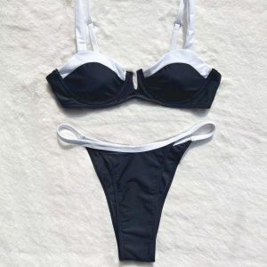 Strój kąpielowy dwuczęściowy z elegancką lamówką Concepta. Czarne bikini Intica, z aplikacjami. Za 159,00 zł.