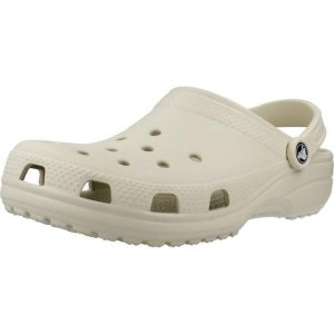 Klapki dla dorosłych Crocs Classic. Brązowe klapki Crocs, bez wzorów, z materiału, bez obcasa. W wyprzedaży za 201,35 zł.