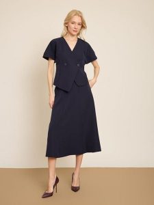 BGN Spódnica w kolorze granatowym rozmiar: 40. Niebieskie spódnice BGN, na imprezę, bez wzorów, midi. Za 86,99 zł.