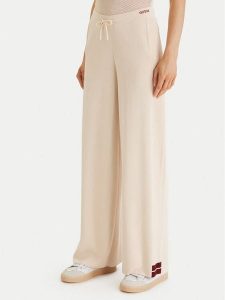 Guess Spodnie dresowe V6GB06 Z0651 Beżowy Wide Leg. Brązowe spodnie dresowe Guess, xs, z aplikacjami, z dresówki. Za 471,99 zł.