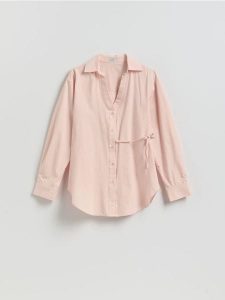 Bawełniana koszula z wiązaniem - brzoskwiniowy. Pomarańczowe koszule Reserved, l, bez wzorów, z bawełny, bez kołnierzyka, bez ramiączek. Za 129,99 zł.