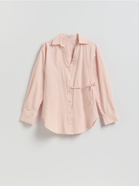 Bawełniana koszula z wiązaniem - brzoskwiniowy. Pomarańczowe koszule Reserved, l, bez wzorów, z bawełny, bez kołnierzyka, bez ramiączek. Za 129,99 zł.