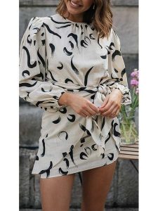 Milan Kiss Sukienka w kolorze kremowo-czarnym rozmiar: S. Brązowe sukienki Milan Kiss, na imprezę, s, bez wzorów, z wiskozy, bez kołnierzyka, bez ramiączek, mini. Za 165,99 zł.