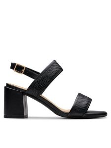 Clarks Sandały Ezoria Sling 26181300 Czarny. Czarne sandały Clarks, bez wzorów, ze skóry, bez obcasa, na słupku, bez zapięcia. Za 219,99 zł.
