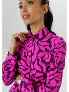 Aniston Bluzka w kolorze różowo-fioletowym rozmiar: 44. Różowe bluzki Aniston, bez wzorów, z wiskozy, bez kołnierzyka, bez ramiączek. Za 87,45 zł.