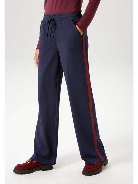 Aniston Spodnie w kolorze granatowym rozmiar: 48. Niebieskie spodnie z wysokim stanem Aniston, bez wzorów, z materiału, z podwyższonym stanem. Za 69,58 zł.