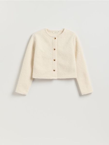 Żakiet z dekoracyjnymi guzikami - złamana biel. Marynarki i żakiety Reserved, l, bez wzorów, z dzianiny. W wyprzedaży za 49,99 zł.