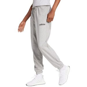 Damskie spodnie dresowe adidas Essentials Linear French Terry Cuffed. Szare spodnie dresowe ADIDAS, bez wzorów, z bawełny. Za 157,99 zł.