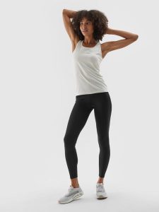4F Legginsy treningowe ze średnim stanem damskie - czarne M. Czarne legginsy 4f, bez wzorów, z dzianiny. Za 119,99 zł.