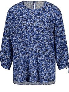 Gerry Weber Bluzka w kolorze niebieskim rozmiar: 46. Niebieskie bluzki Gerry Weber, bez wzorów, z wiskozy, bez kołnierzyka, bez ramiączek. Za 122,96 zł.