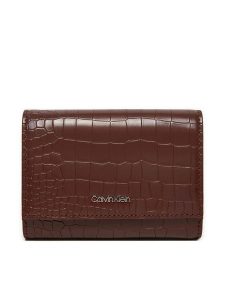 Calvin Klein Portfel Ck Must Md Trifold K60K612453 Brązowy. Brązowe portfele Calvin Klein, bez wzorów, ze skóry. Za 259,99 zł.