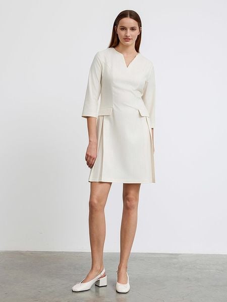 BGN Sukienka w kolorze kremowym rozmiar: 38. Brązowe sukienki BGN, na imprezę, bez wzorów, bez kołnierzyka, bez ramiączek, mini. Za 78,99 zł.