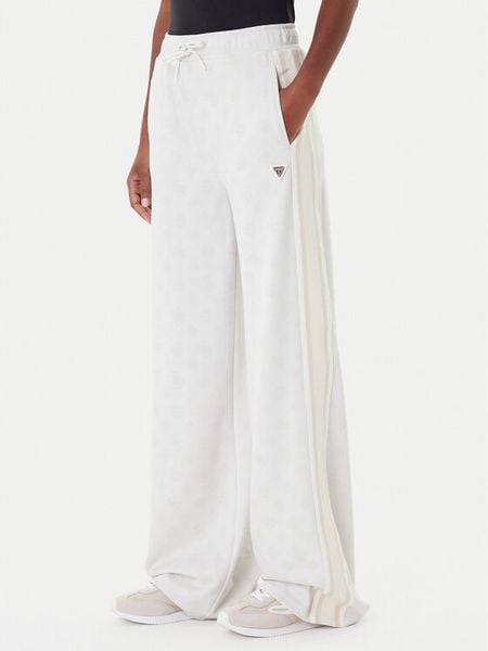 Guess Spodnie dresowe V5YB10 K0282 Écru Relaxed Fit. Spodnie dresowe Guess, m, z aplikacjami, z dresówki. Za 379,99 zł.