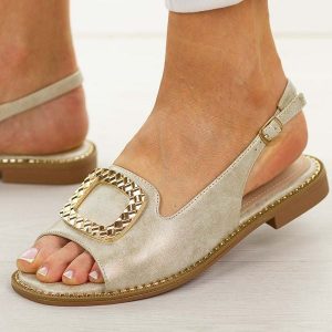 Złote płaskie sandały damskie Potocki 43340. Żółte sandały POTOCKI, z aplikacjami, z materiału, bez obcasa, na płaskiej podeszwie, bez zapięcia. Za 149,00 zł.