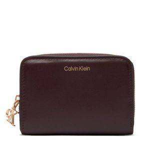 Portfel Calvin Klein. Brązowe portfele Calvin Klein, bez wzorów. Za 299,99 zł.
