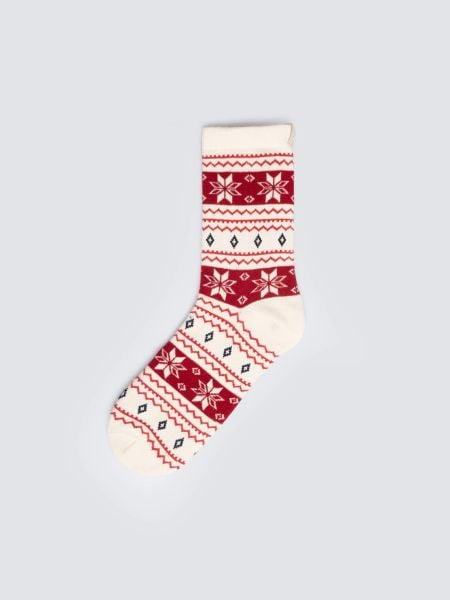 Skarpety damskie długie ze wzorem skandynawskim biało-czerwone Mela 100. Białe skarpetki Big Star, bez wzorów, z bawełny. Za 19,99 zł.